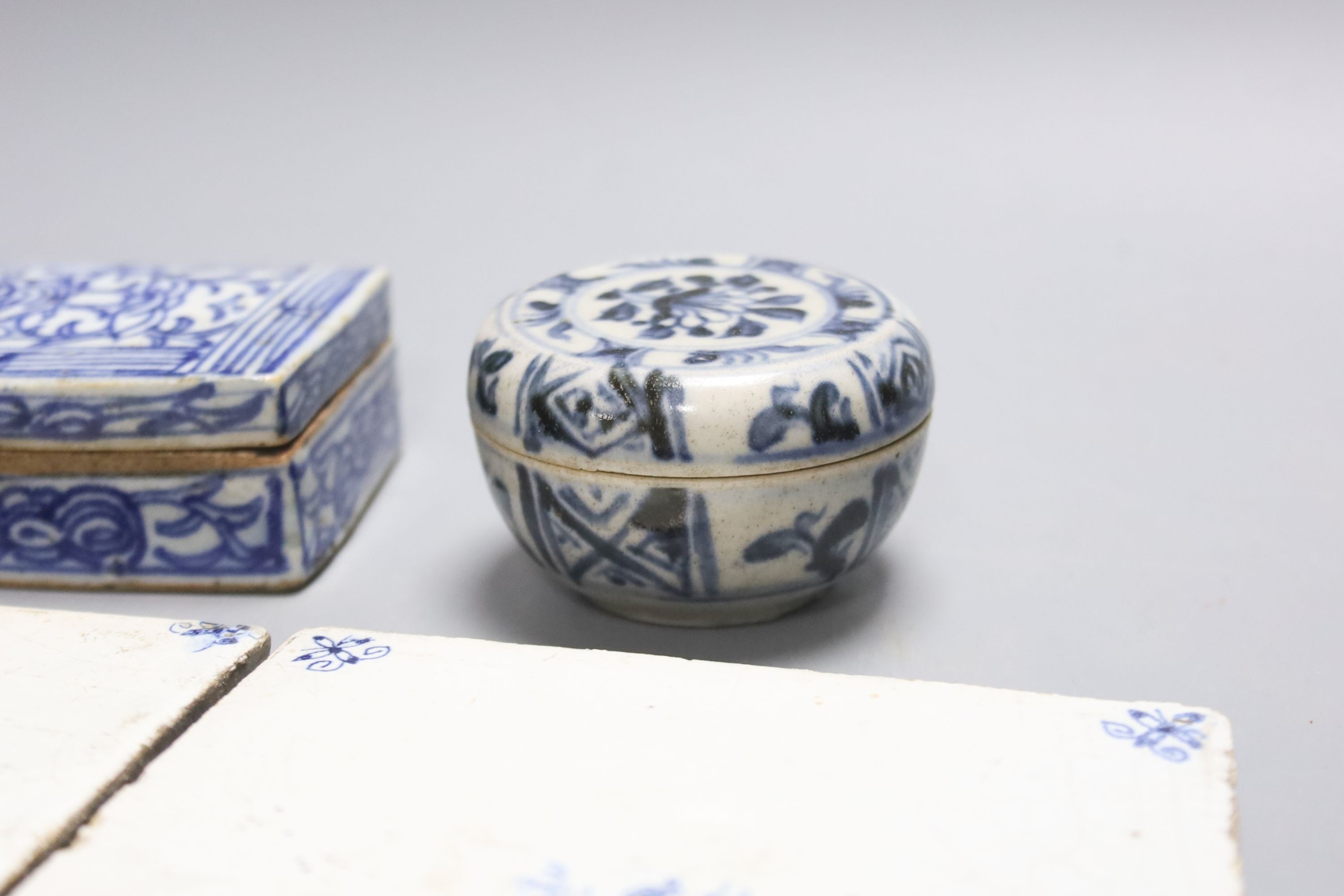 Two 18th century Dutch Delft blue and white tiles, two Chinese porcelain boxes and covers and sundry items